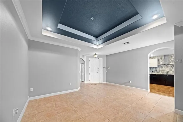 a kitchen with stainless steel appliances a refrigerator and a stove