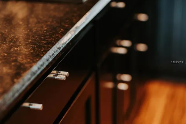 an aerial view of a house with outdoor space