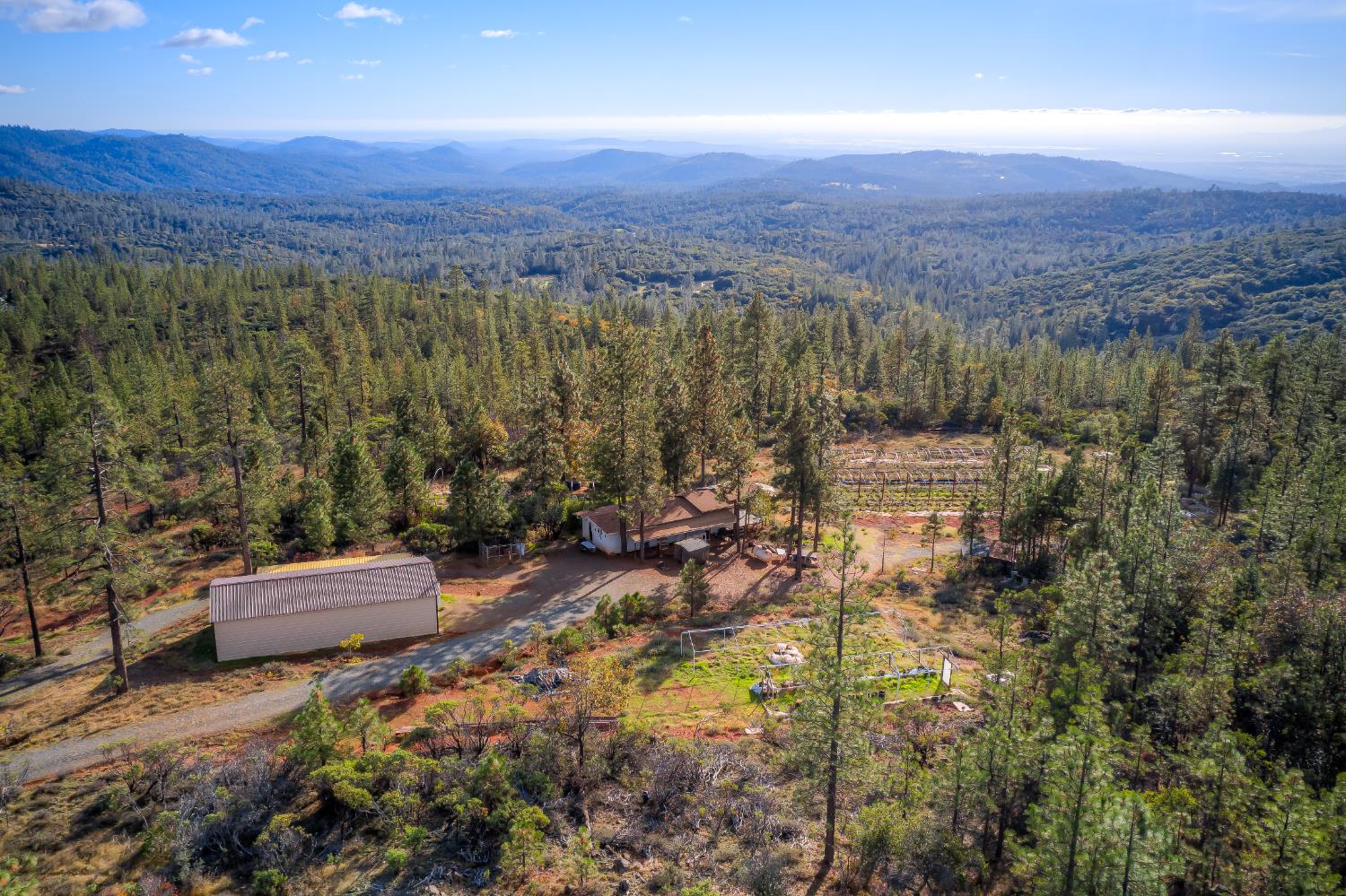 0 Black Tail Road Oroville, CA 95966 - Photo 22 of 33 a view of a city with lush green forest