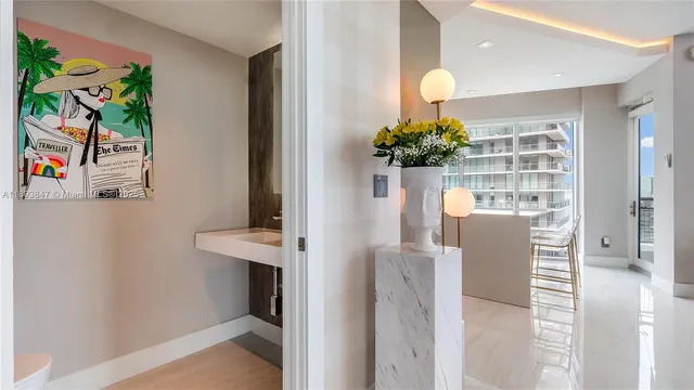 a view of living room with furniture and flowers