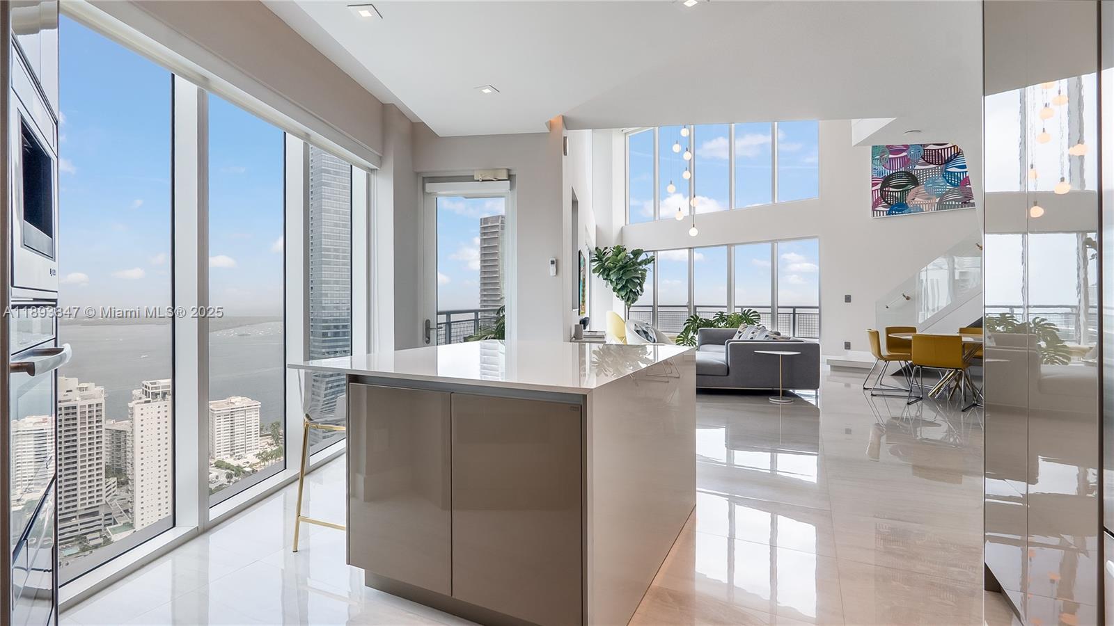 60 Southwest 13th Street, Unit 4200 Miami, FL 33130 - Photo 13 of 52 a living room with furniture and a large window