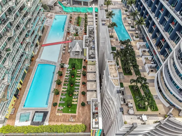 a view of a city with tall buildings