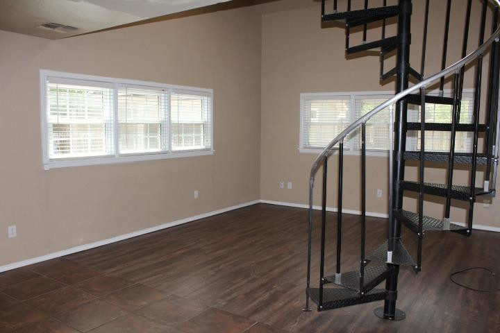 3111 30th Street Lubbock, TX 79410 - Photo 17 of 22 a view of an entryway with wooden floor