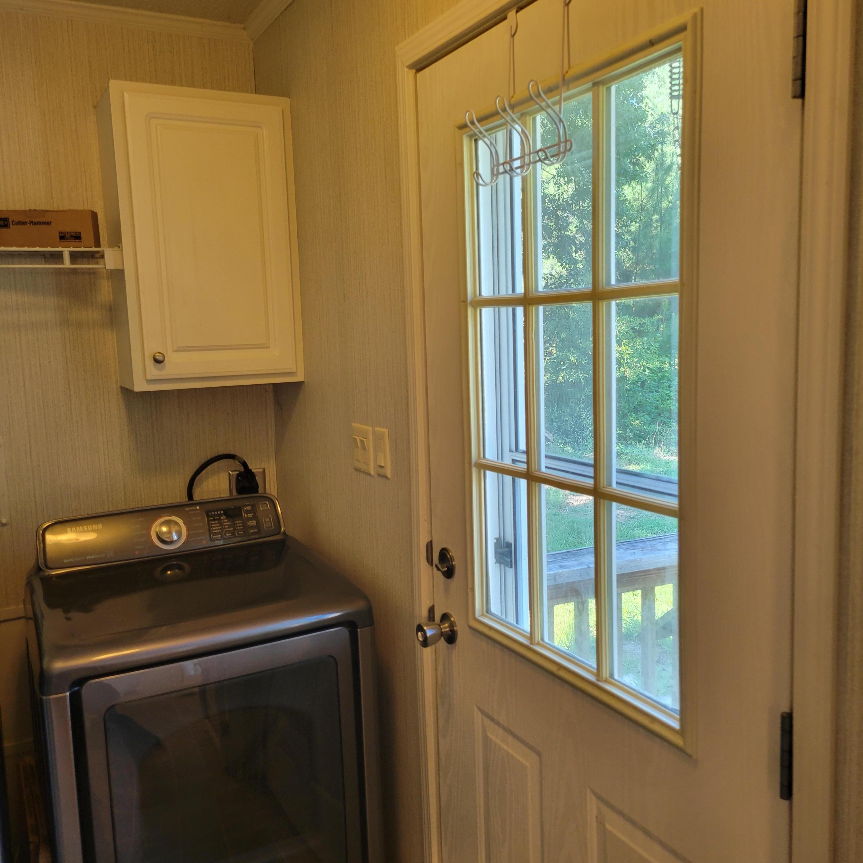 1698 Oakwood Road Thomson, GA 30824 - Photo 20 of 49 9-Light glass door to the rear deck.