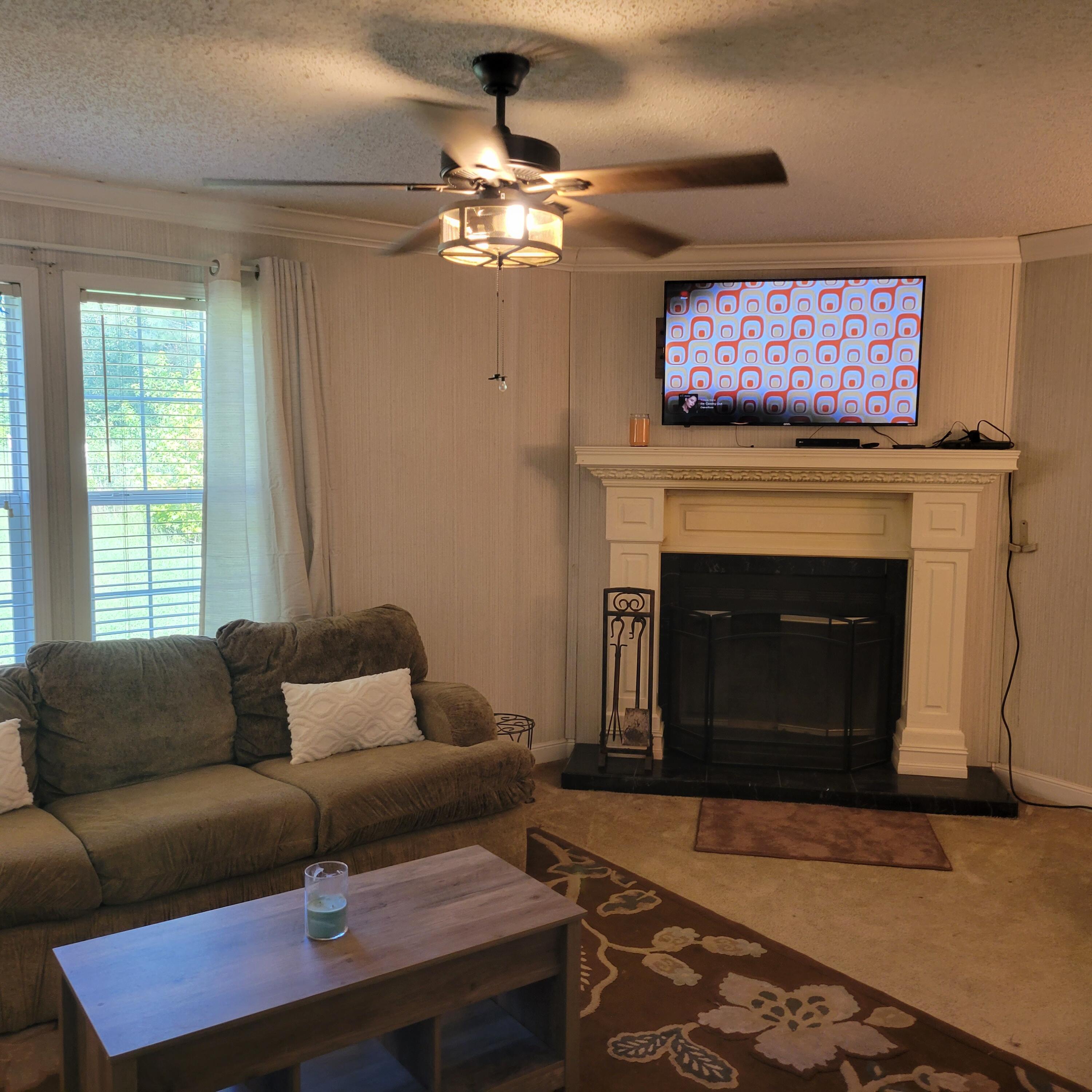 1698 Oakwood Road Thomson, GA 30824 - Photo 23 of 49 Rich looking mantle for the wood burning fireplace.