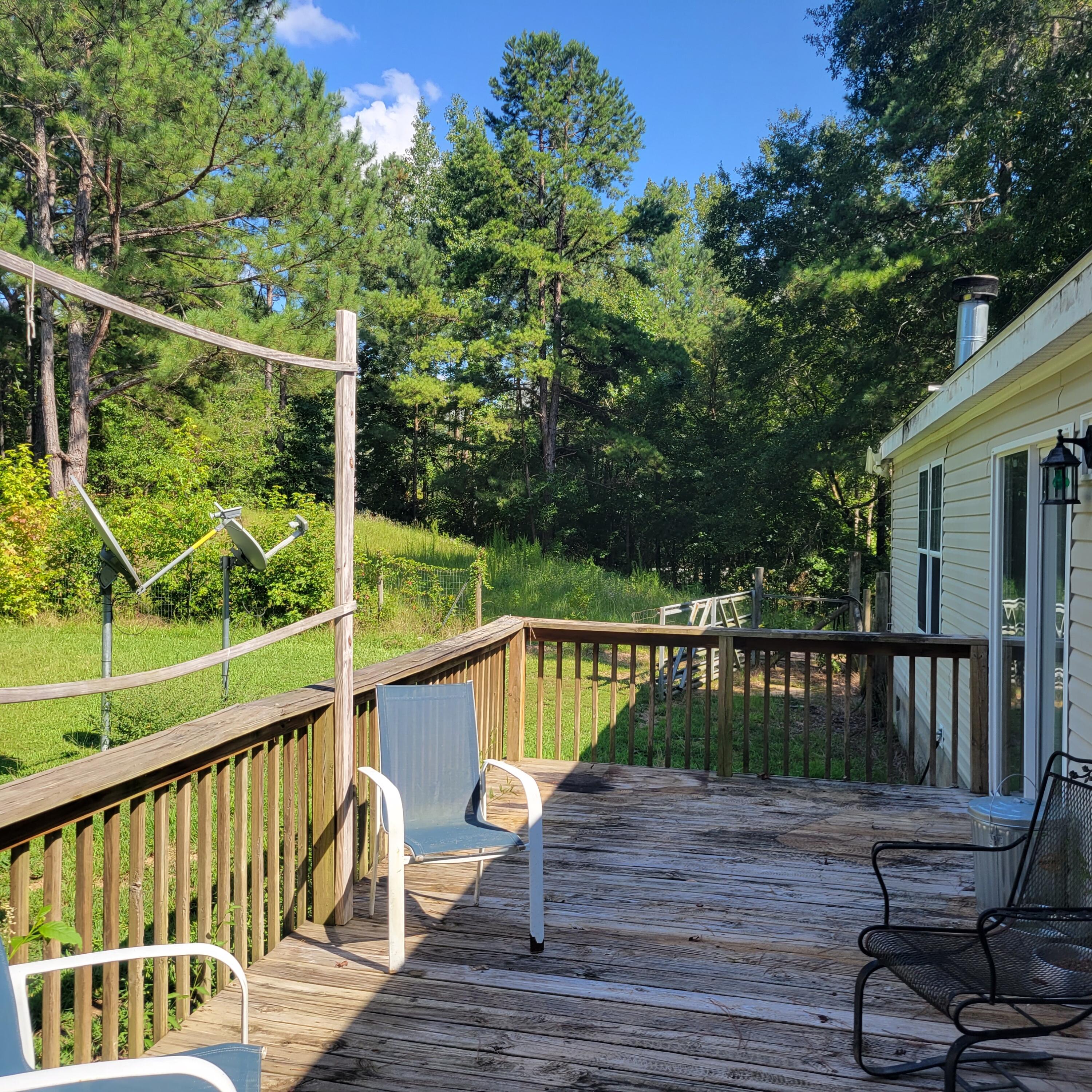 1698 Oakwood Road Thomson, GA 30824 - Photo 36 of 49 Big long deck for grillin and entertaining!