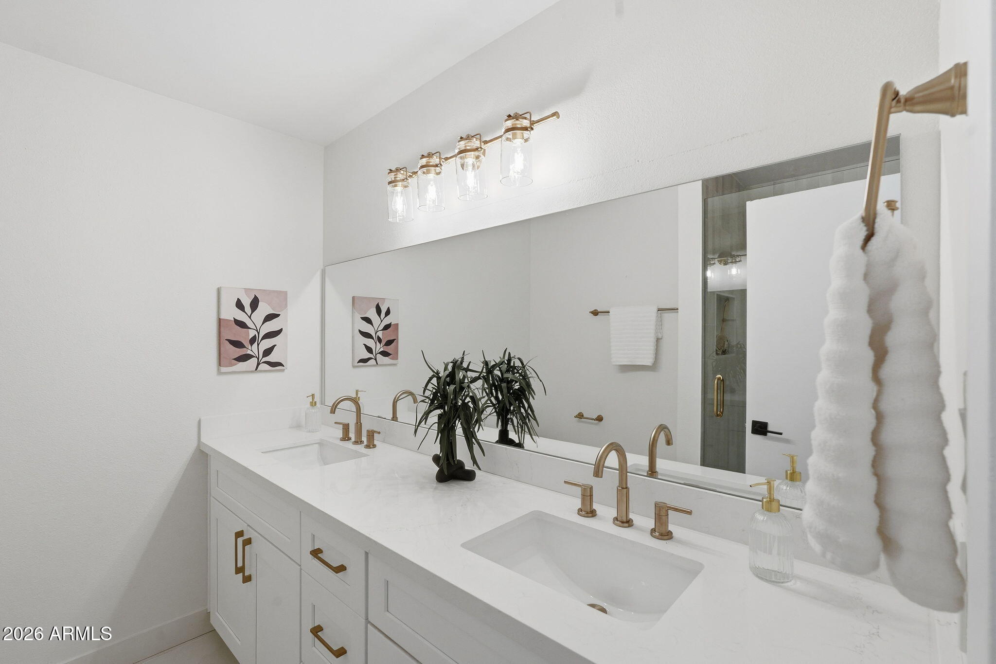 1663 West Monte Avenue Mesa, AZ 85202 - Photo 21 of 21 a bathroom with a sink and a mirror