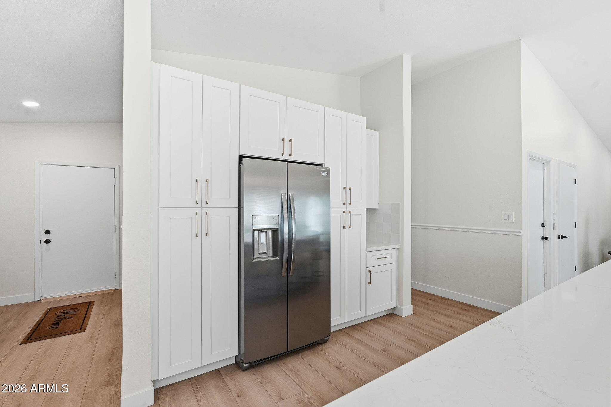 1663 West Monte Avenue Mesa, AZ 85202 - Photo 5 of 21 a kitchen with stainless steel appliances granite countertop a refrigerator and a sink