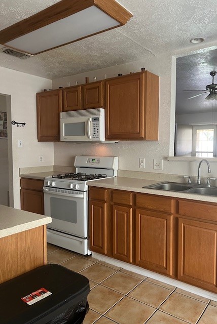 2539 Goldspring Lane Spring, TX 77373 - Photo 2 of 21 a kitchen with a sink stove and cabinets
