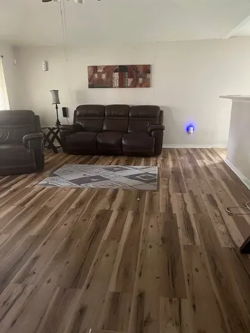 a view of a workspace with furniture