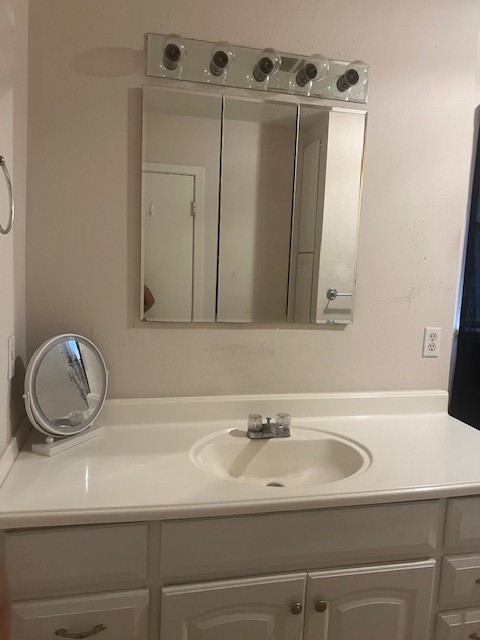 2539 Goldspring Lane Spring, TX 77373 - Photo 8 of 21 a bathroom with a sink and a mirror