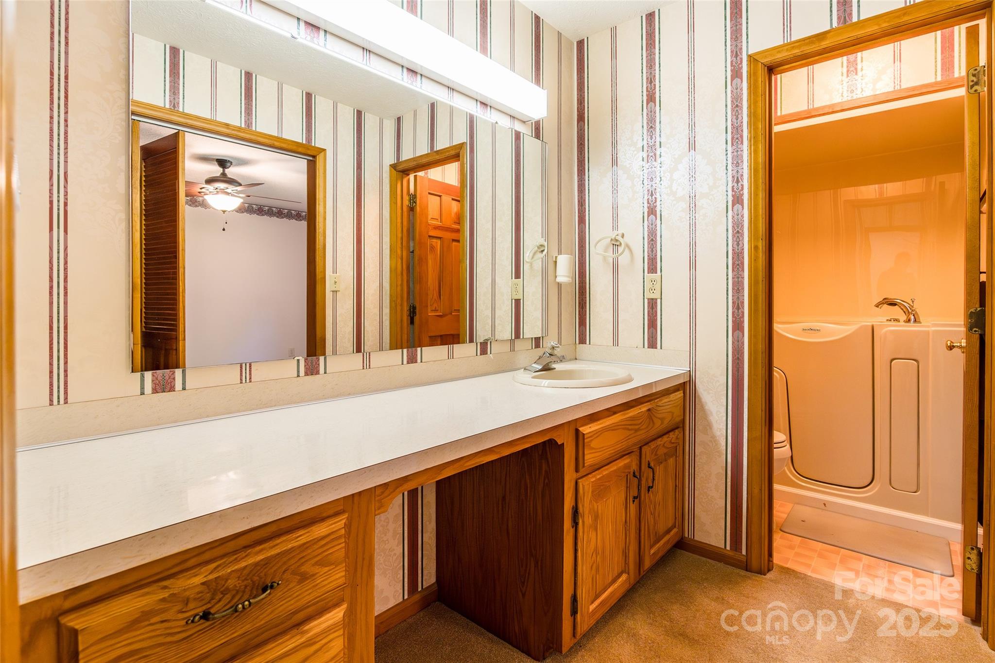 673 Tirzah Road York, SC 29745 - Photo 21 of 37 a bathroom with a double vanity sink and a mirror