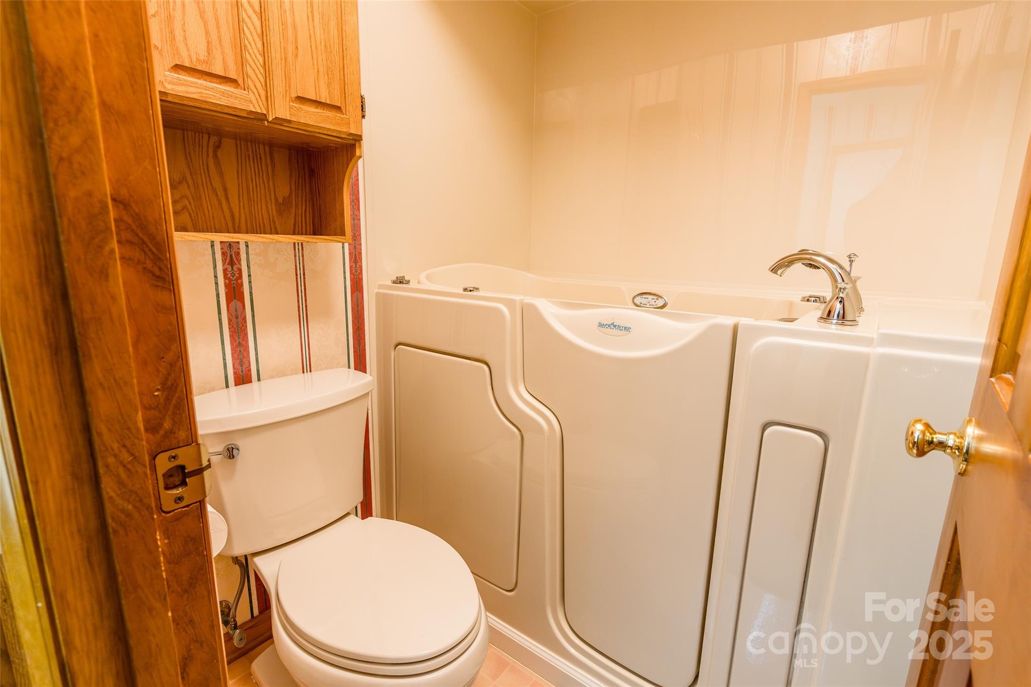 673 Tirzah Road York, SC 29745 - Photo 22 of 37 a white toilet sitting next to a sink