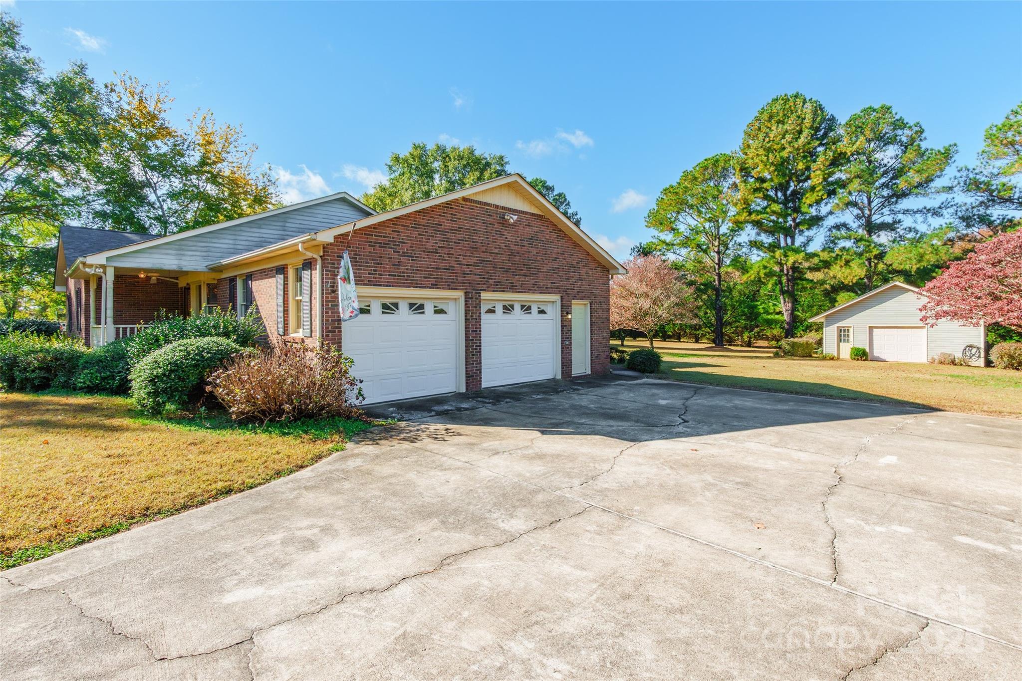 673 Tirzah Road York, SC 29745 - Photo 30 of 37 a front view of a house with a yard