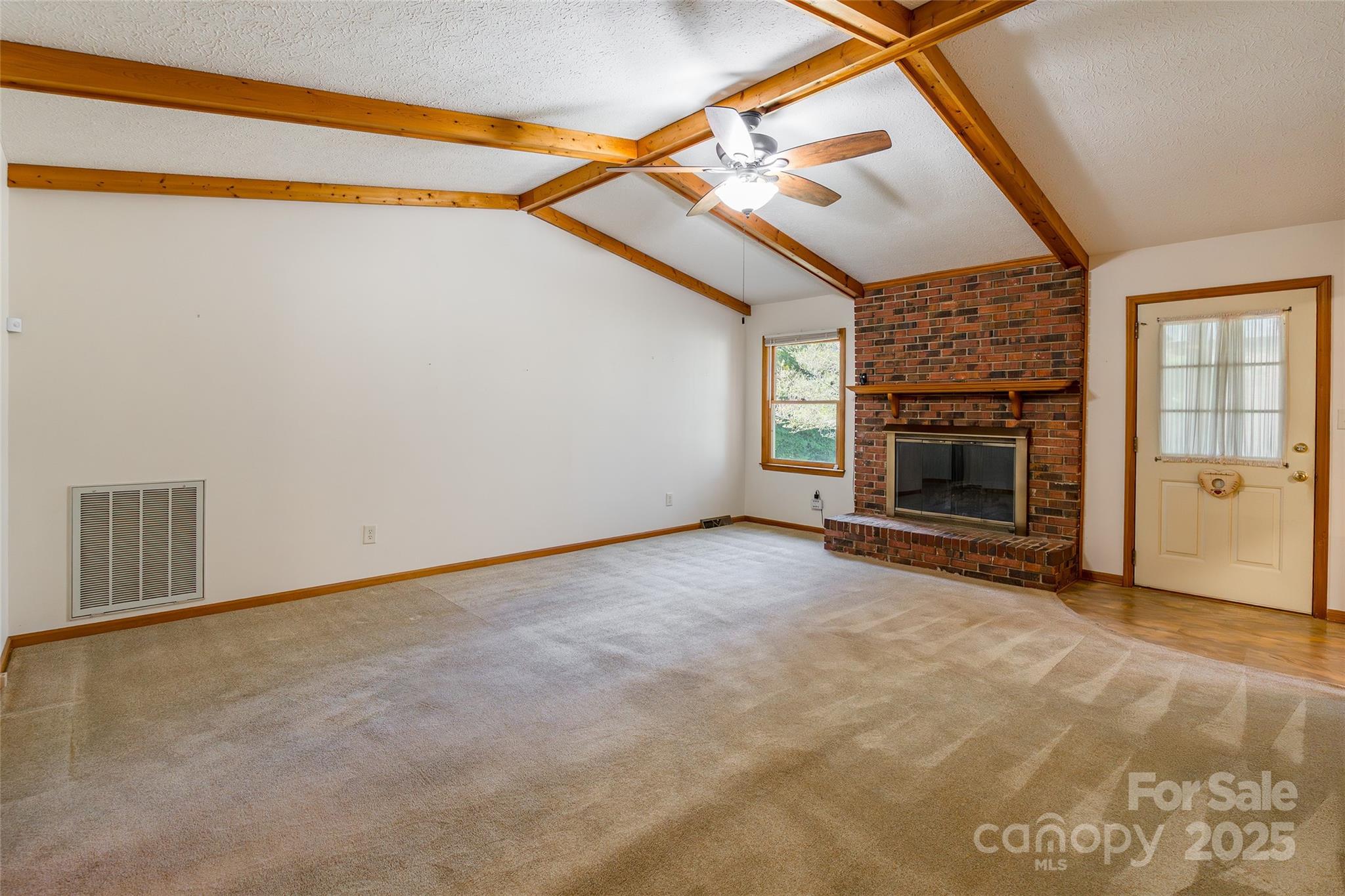 673 Tirzah Road York, SC 29745 - Photo 7 of 37 a view of empty room with a fireplace