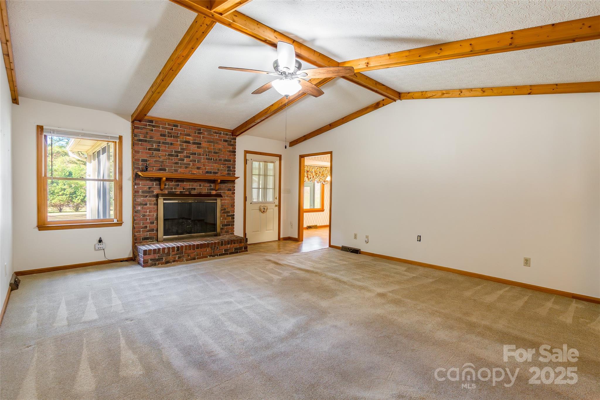 673 Tirzah Road York, SC 29745 - Photo 8 of 37 a view of empty room with a fireplace