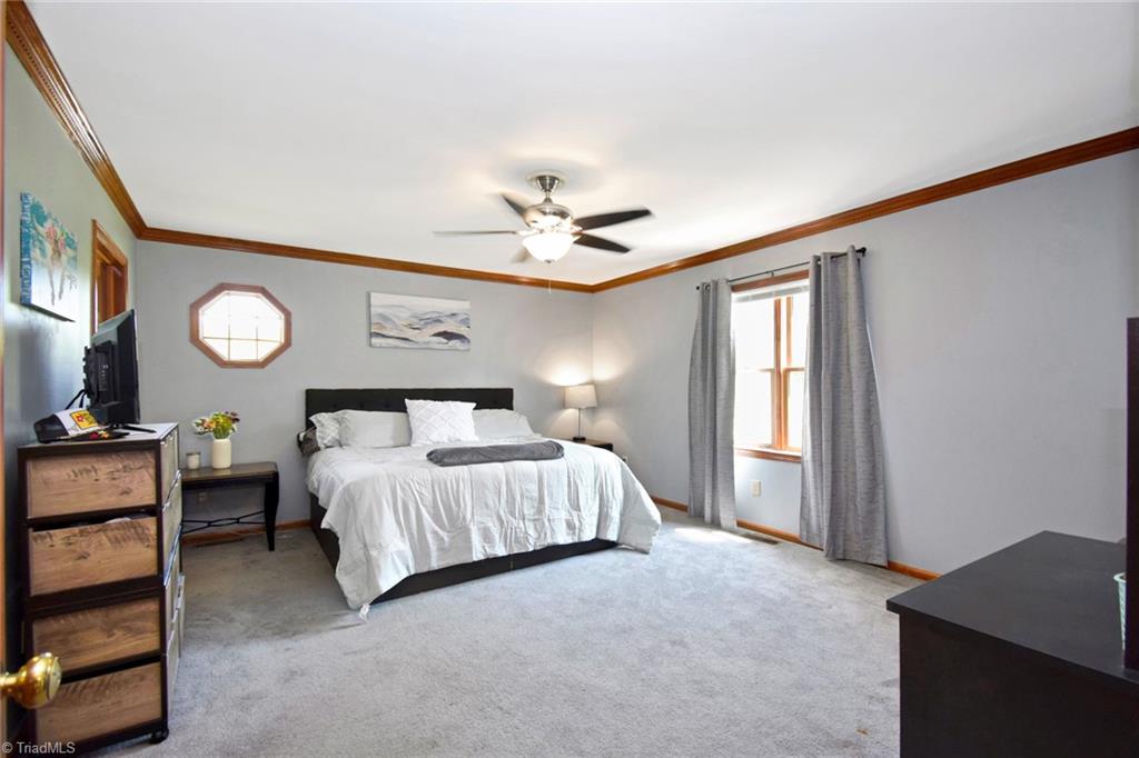 1297 Boiling Springs Road Purlear, NC 28665 - Photo 18 of 46 Primary Bedroom