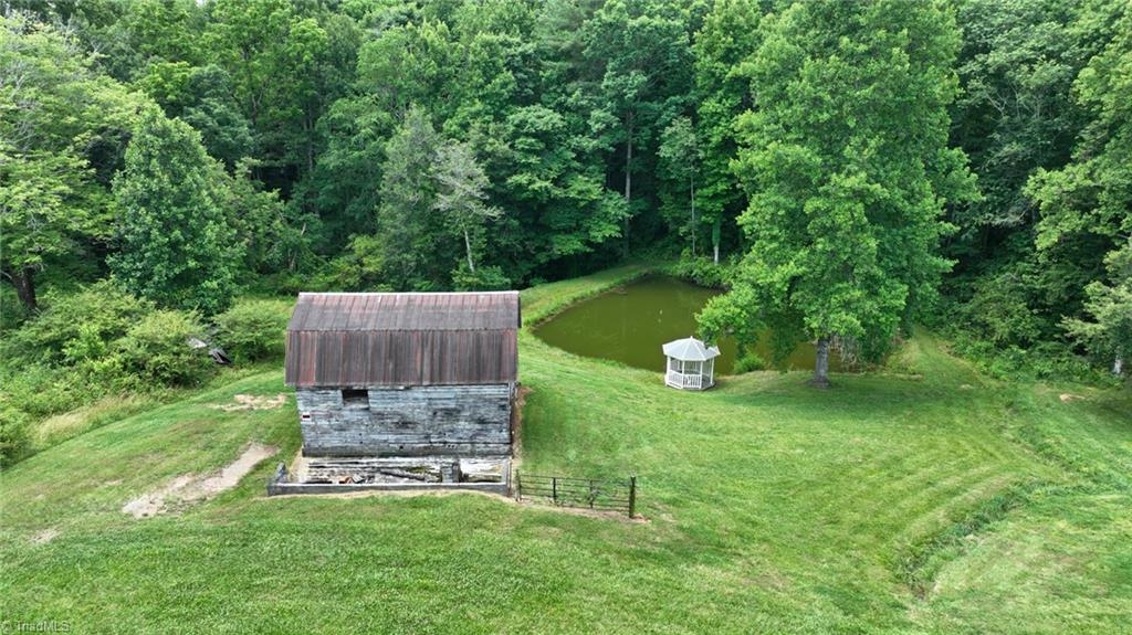1297 Boiling Springs Road Purlear, NC 28665 - Photo 2 of 46 Barn & Pond
