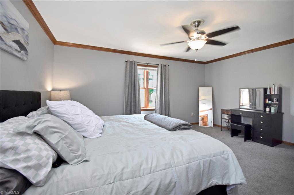 1297 Boiling Springs Road Purlear, NC 28665 - Photo 21 of 46 Primary Bedroom