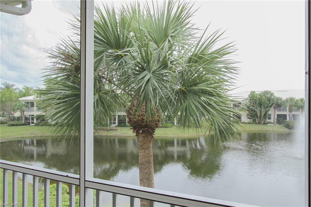 4615 Hawks Nest Drive, Unit B201 Naples, FL 34114 - Photo 4 of 14 a view of a lake view