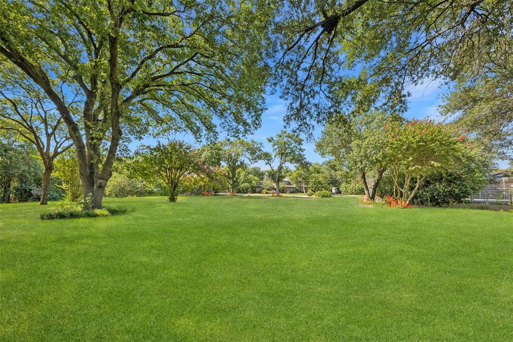 4931 Northaven Road Dallas, TX 75229 - Photo 4 of 8 a view of field with trees