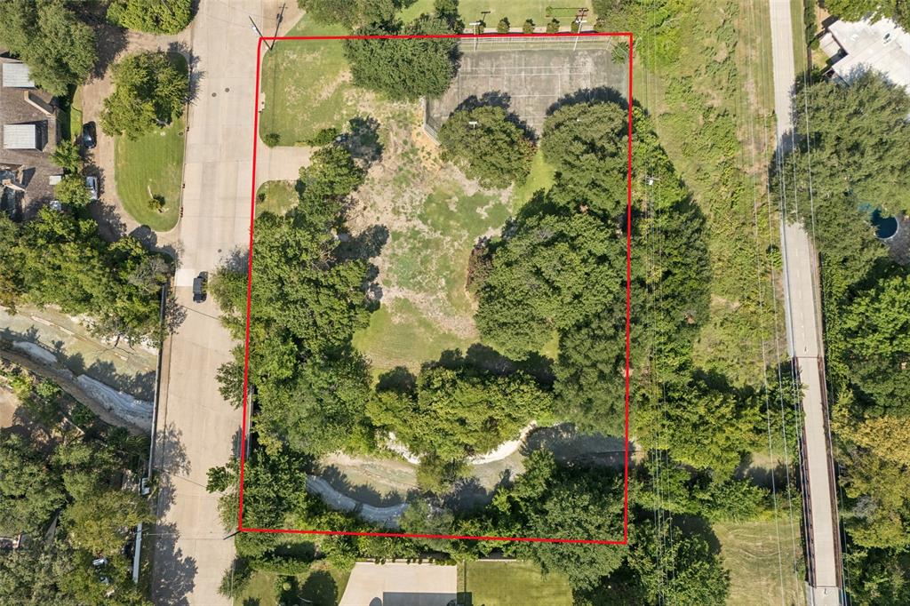 4931 Northaven Road Dallas, TX 75229 - Photo 8 of 8 a view of a garden