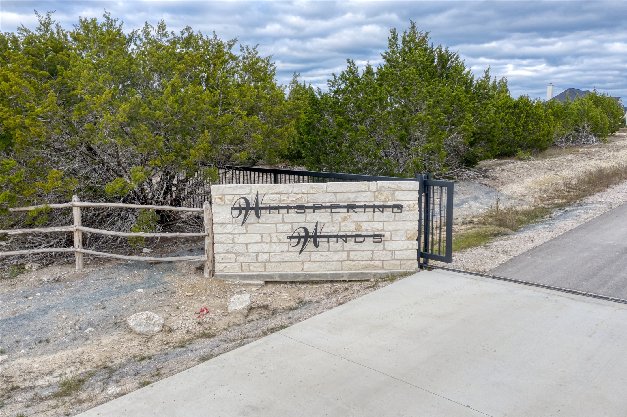 169 Whispering Wind Road Bertram, TX 78605 - Photo 2 of 16 a view of backyard with outdoor space
