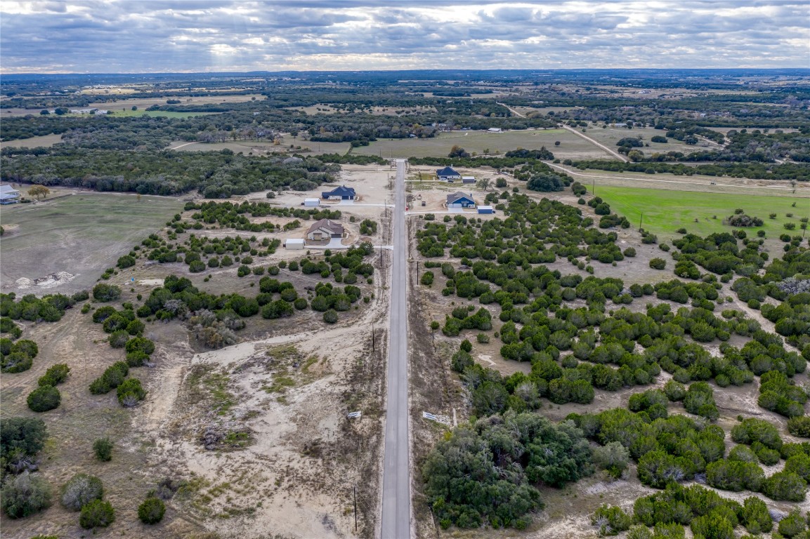 169 Whispering Wind Road Bertram, TX 78605 - Photo 5 of 16 a view of a city with ocean view