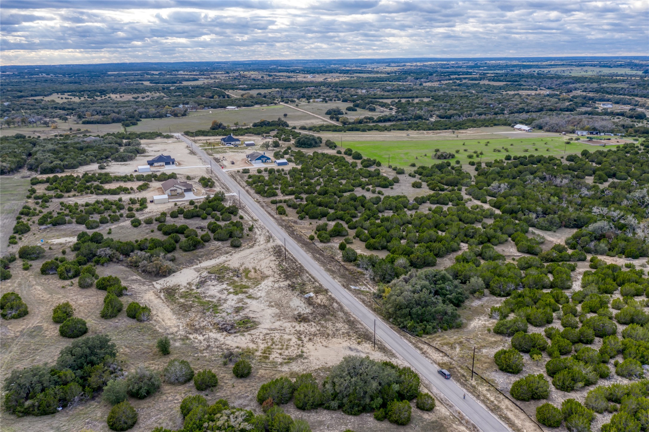 169 Whispering Wind Road Bertram, TX 78605 - Photo 7 of 16 a view of a city with ocean view