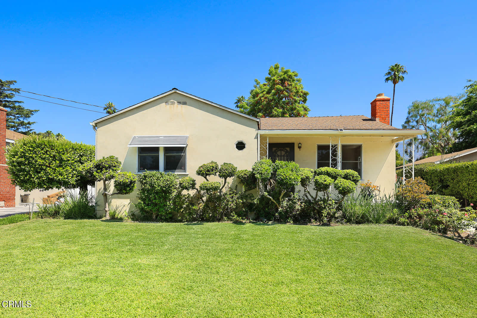 563 Toolen Place Pasadena, CA 91103 - Photo 2 of 12 a front view of a house with garden