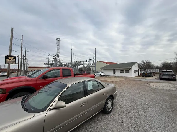 a view of pool table and chairs