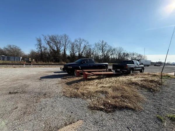 a view of outdoor space and car parked