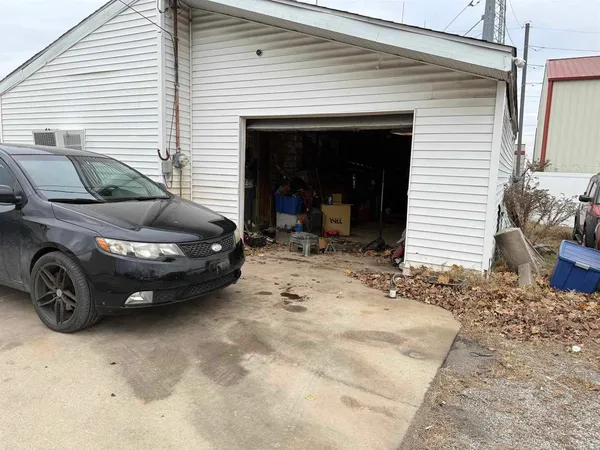 a view of a car in front of house