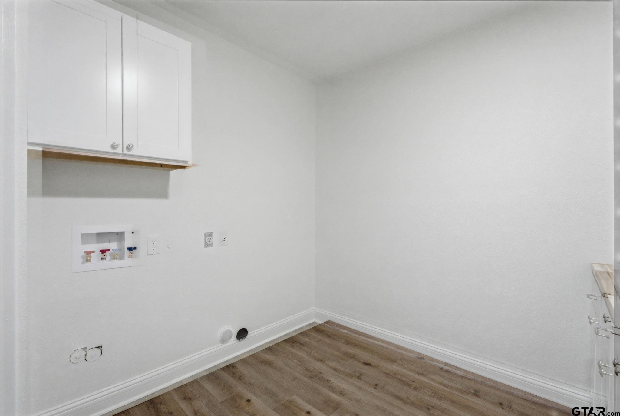 2716 Manilee Lane Tyler, TX 75702 - Photo 18 of 20 a view of small space with wooden floor