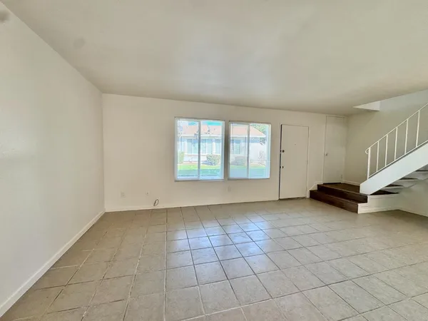 a kitchen with stainless steel appliances granite countertop a stove and a sink