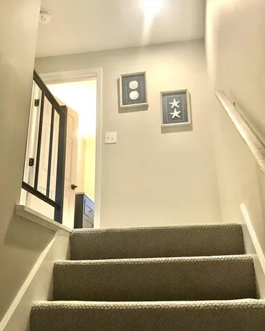 a view of a living room with a large window