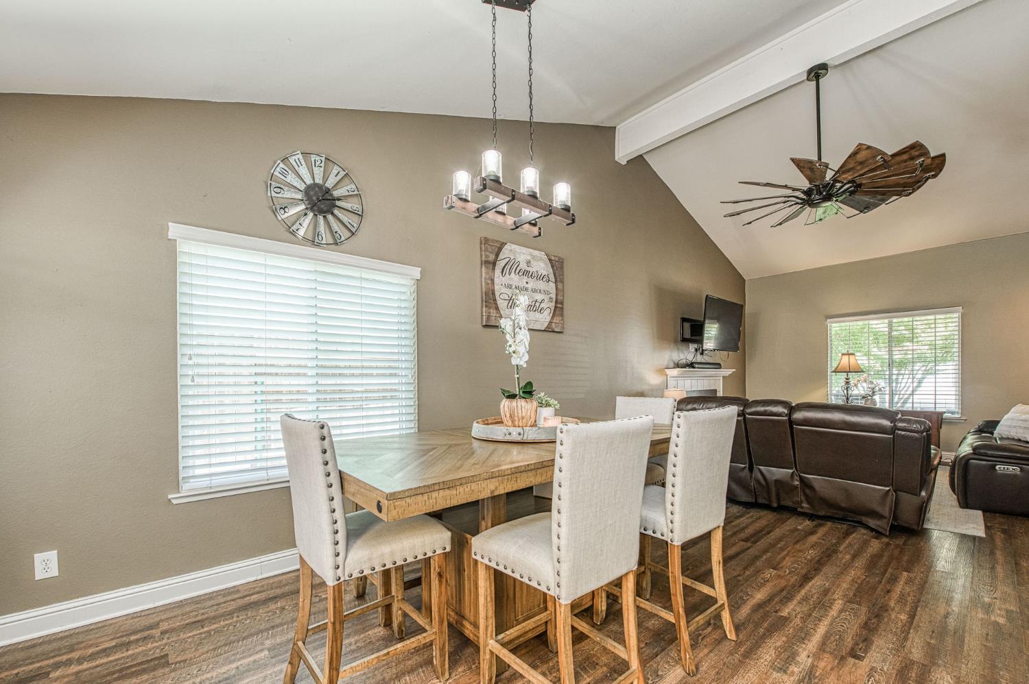 980 North Adler Avenue Clovis, CA 93611 - Photo 12 of 42 a view of a dining room with furniture window and wooden floor