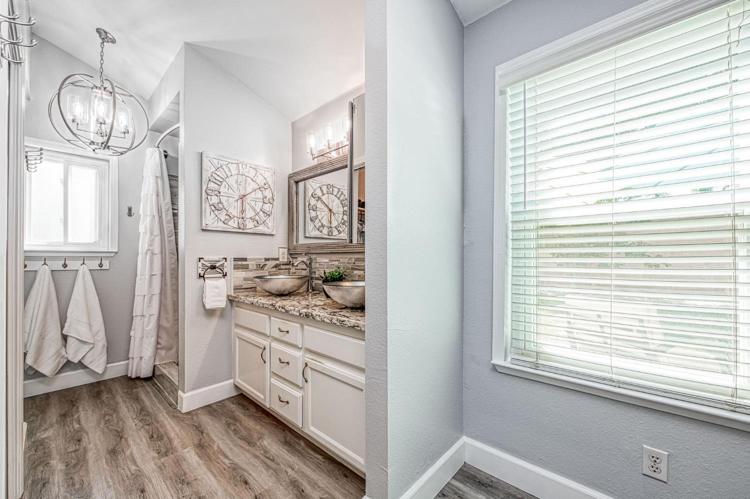 980 North Adler Avenue Clovis, CA 93611 - Photo 26 of 42 a view of a kitchen with wooden floor