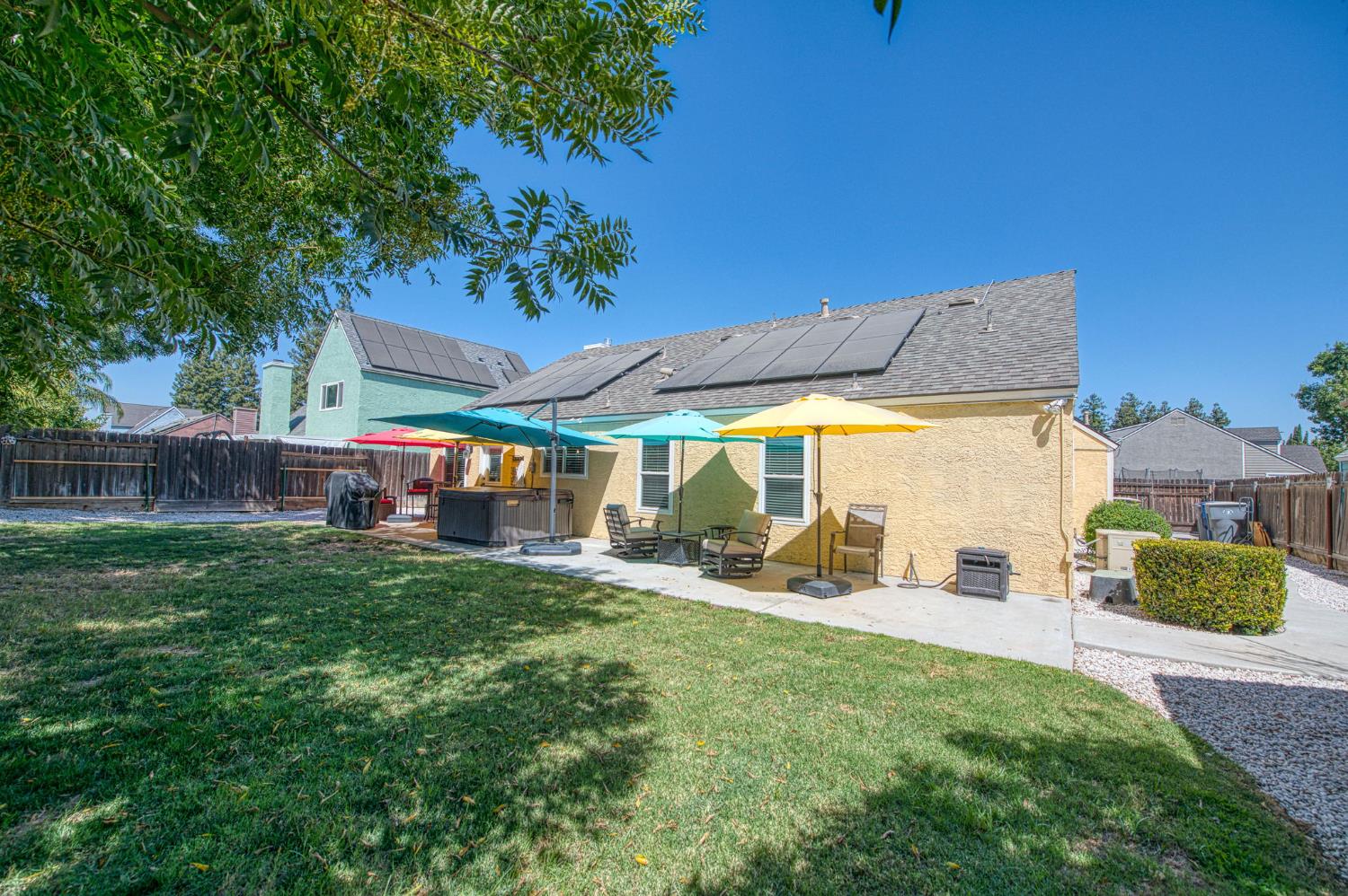 980 North Adler Avenue Clovis, CA 93611 - Photo 35 of 42 a view of a house with a yard