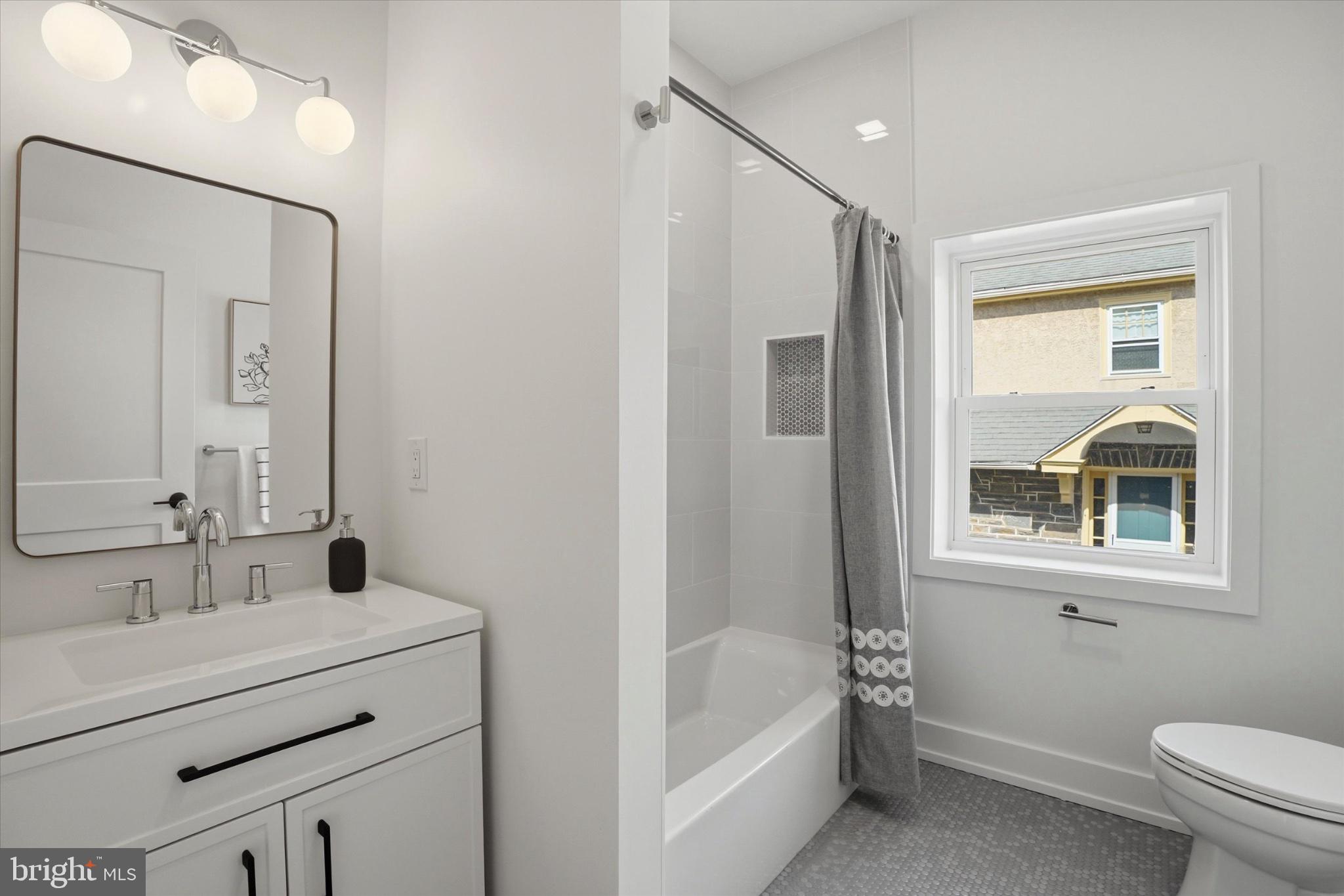 425 Grove Place Narberth, PA 19072 - Photo 23 of 35 Modern bathroom with natural light.