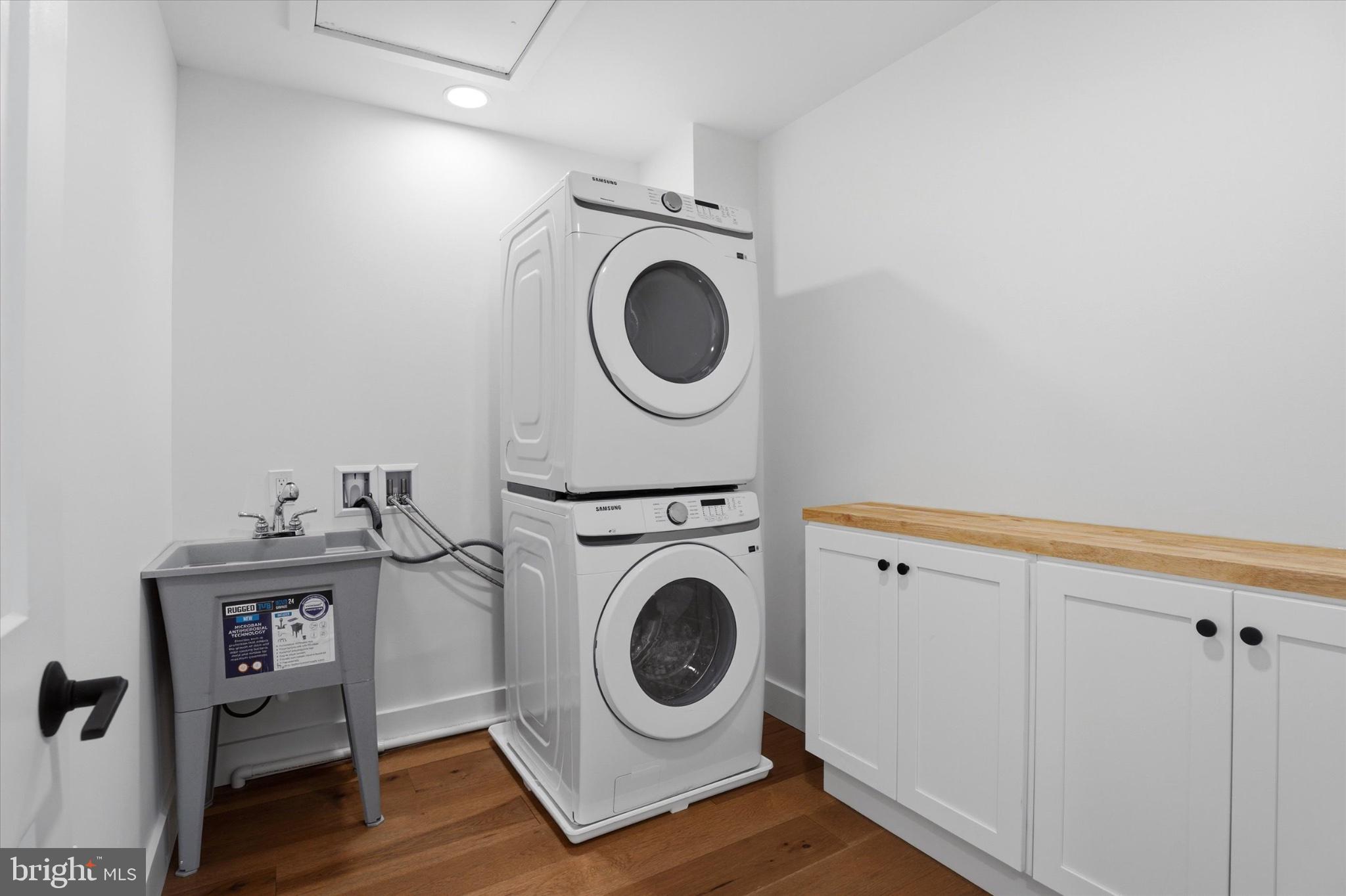 425 Grove Place Narberth, PA 19072 - Photo 26 of 35 Modern laundry space with sleek appliances.