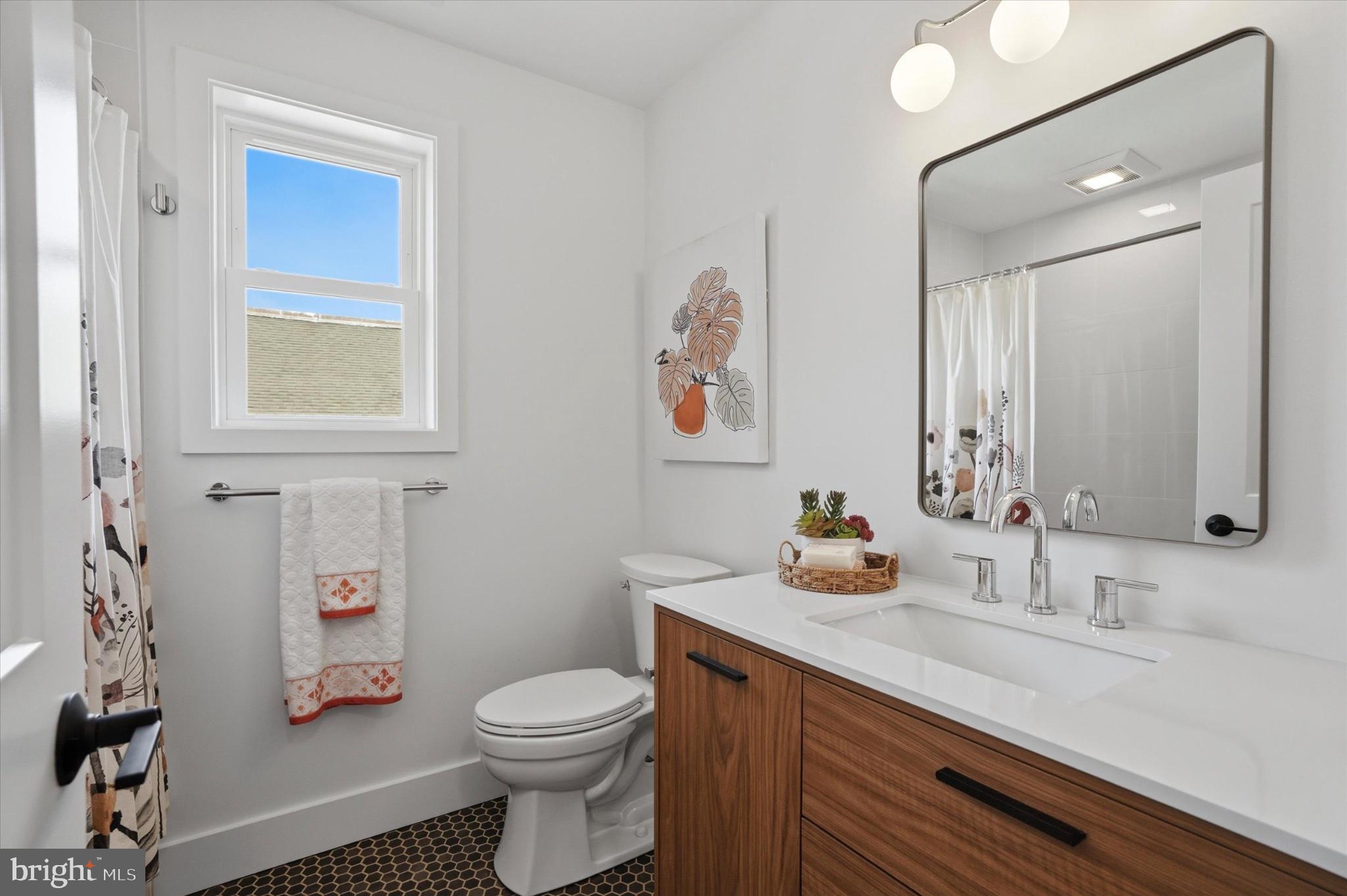425 Grove Place Narberth, PA 19072 - Photo 27 of 35 Bright and modern bathroom oasis.