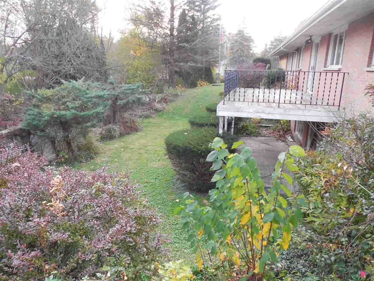 3305 Spring Creek Road Rockford, IL 61107 - Photo 18 of 20 a view of a back yard of the house