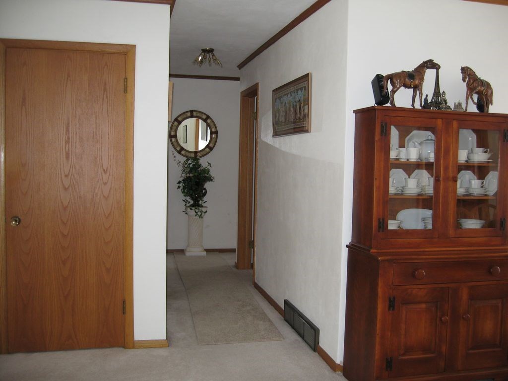 3305 Spring Creek Road Rockford, IL 61107 - Photo 10 of 20 a view of front door and bedroom