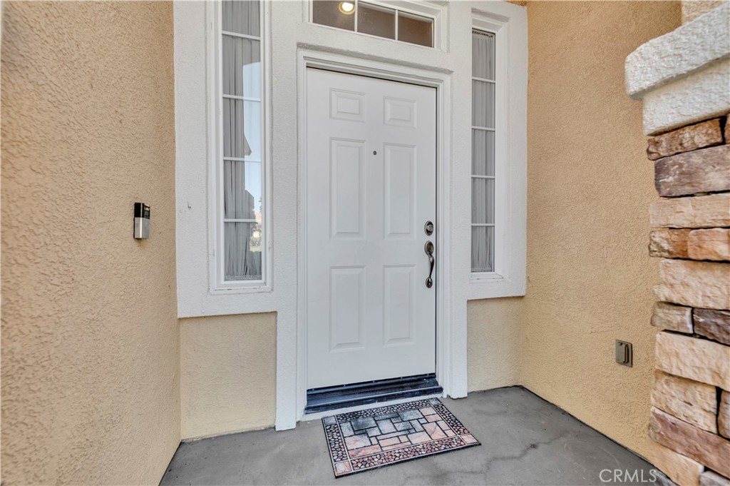 37678 Newcastle Road Murrieta, CA 92563 - Photo 11 of 44 a view of wooden floor and windows in a room