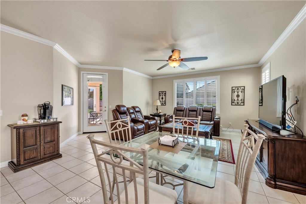 37678 Newcastle Road Murrieta, CA 92563 - Photo 19 of 44 a view of a dining room with furniture window and outside view