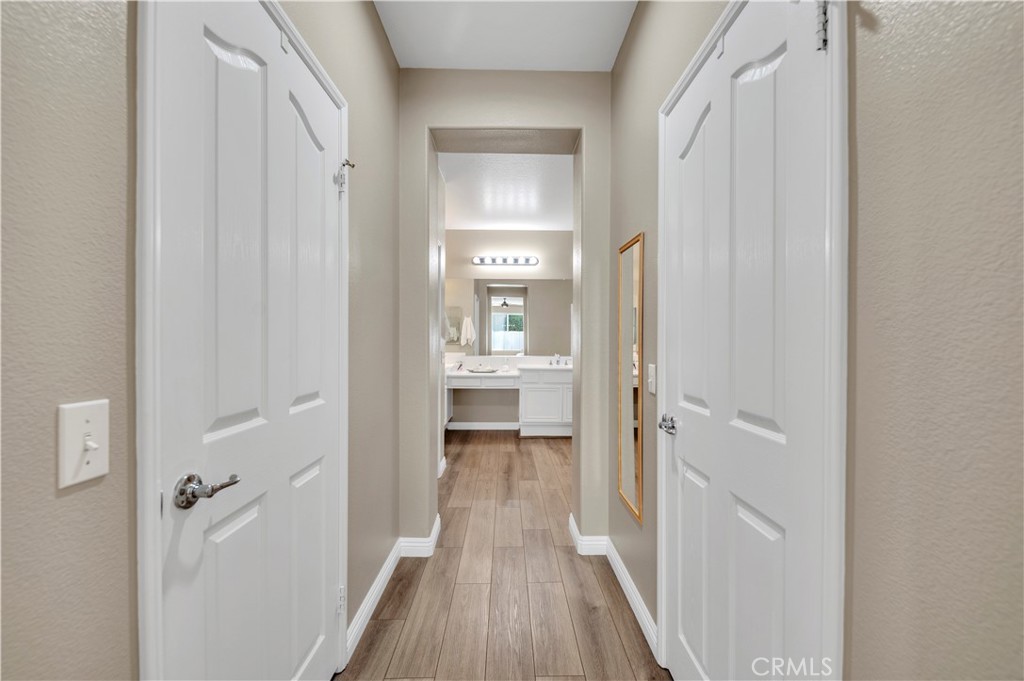 37678 Newcastle Road Murrieta, CA 92563 - Photo 23 of 44 a view of a bathroom from a hallway