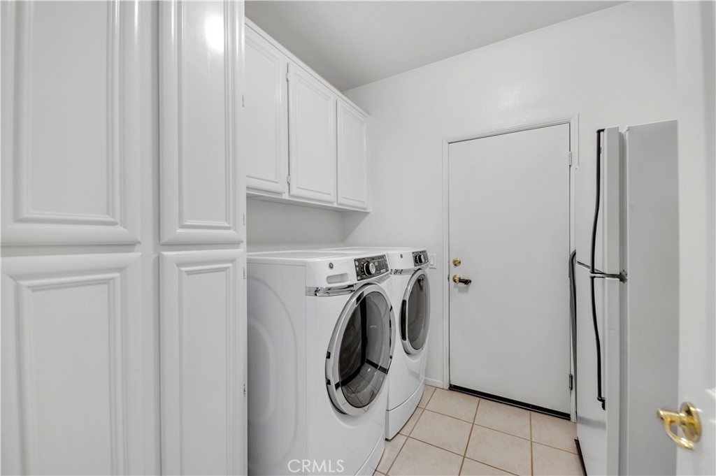 37678 Newcastle Road Murrieta, CA 92563 - Photo 33 of 44 a utility room with dryer and washer