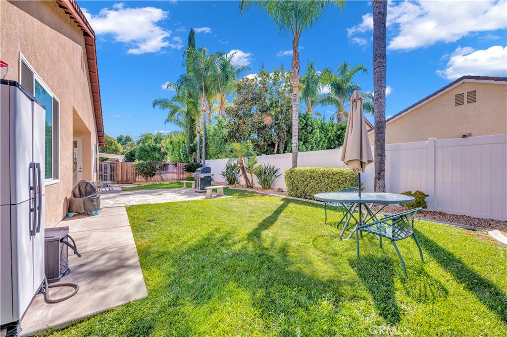 37678 Newcastle Road Murrieta, CA 92563 - Photo 36 of 44 a view of an house with backyard porch and sitting area