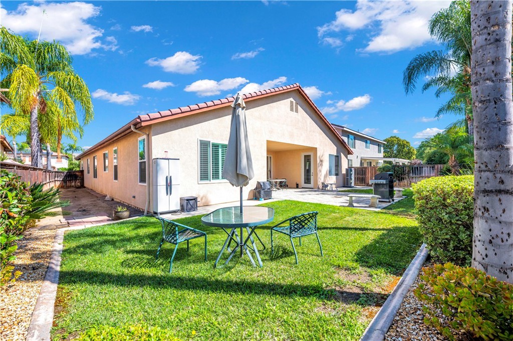 37678 Newcastle Road Murrieta, CA 92563 - Photo 37 of 44 a view of house with backyard and patio